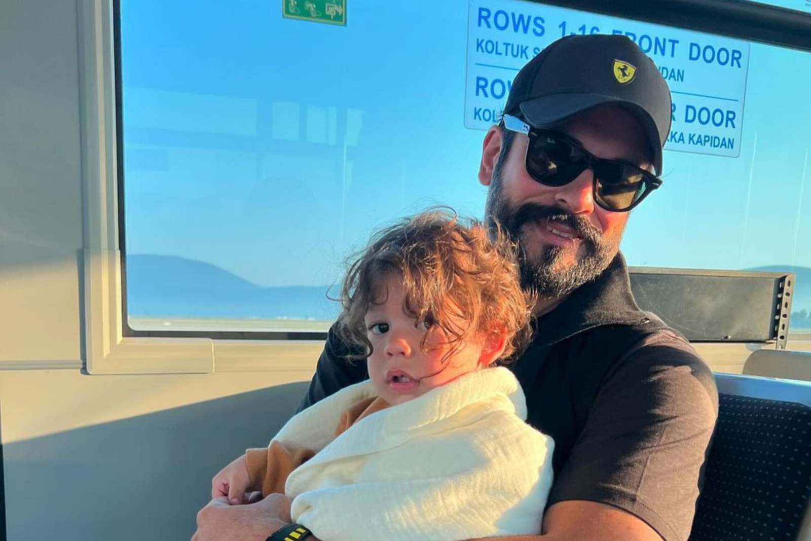 Burak Ozcivit holding his son Kerem, April 13, 2024. (Photo via Instagram / @burakozcivit)