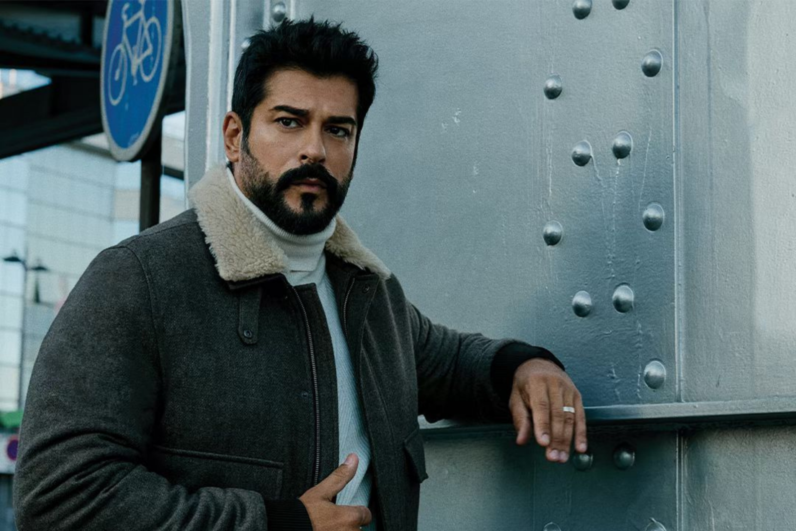 Burak Ozcivit poses in a stylish coat for a brand advertisement, October 16, 2024. (Photo via Instagram / @burakozcivit)