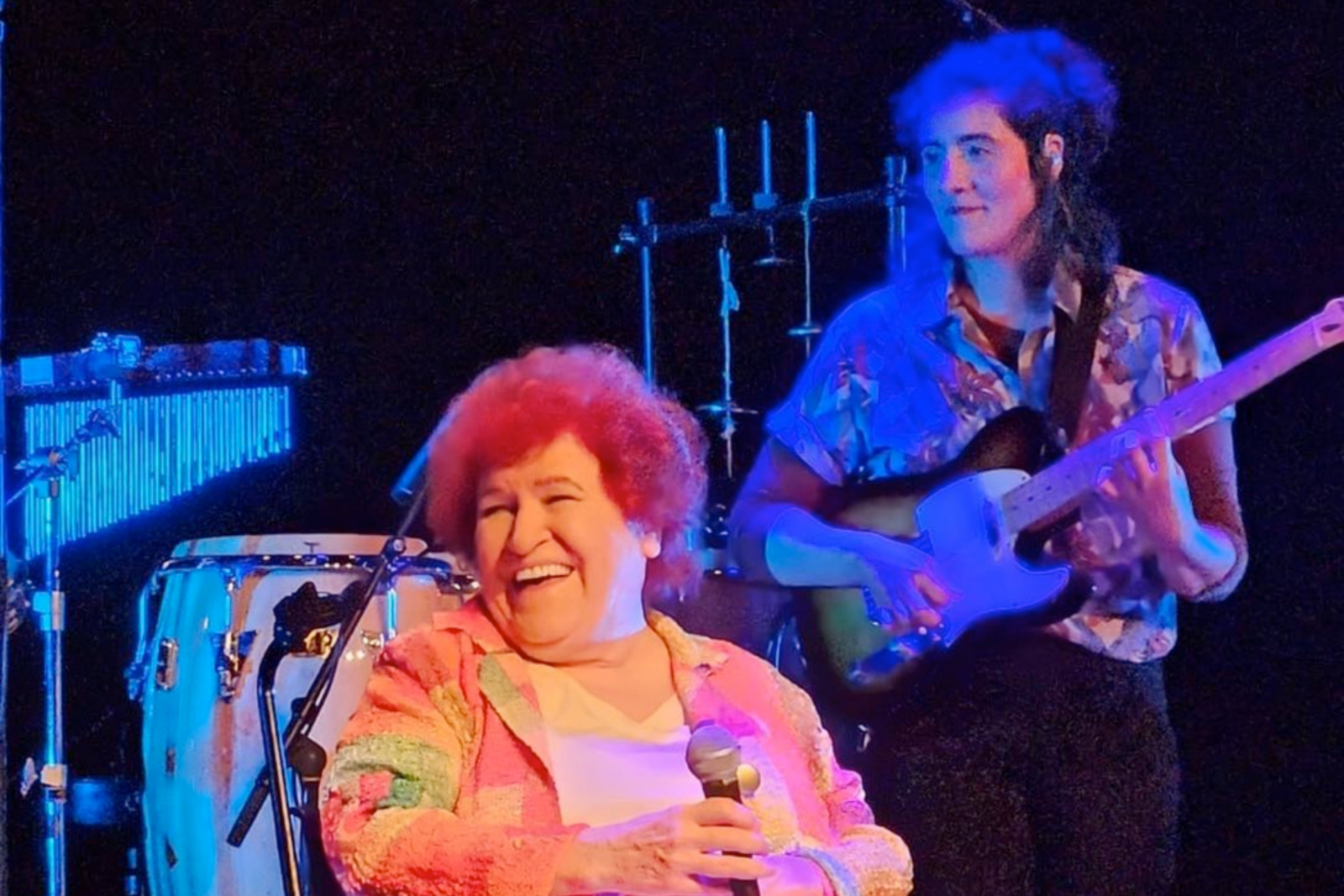 Turkish folk singer Selda Bagcan smiling full of happiness while on stage in Little Waves festival, Genk, Belgium, April 23, 2024. (Photo via Instagram / @seldabagcanofficial)