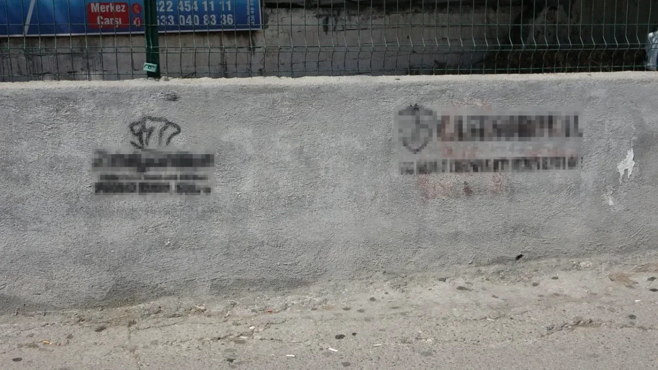 Betting slogans are seen on street walls in Adana (blurred in the screenshot), Türkiye, on Jul. 10, 2024. (IHA Photo)