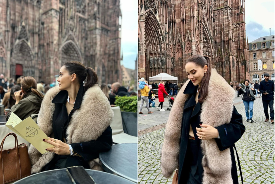 Fahriye Evcen enjoys a moment at a cafe while wearing the fur coat that generated a significant reaction on social media, in Strasbourg, France, Nov. 4, 2024. (Photo via Instagram / @evcenf)