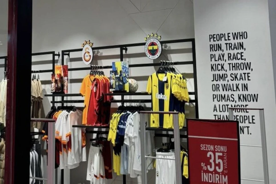 Galatasaray and Fenerbahce's five-star jerseys are placed next to each other in a Puma Store, on July 2024. (Photo via X)