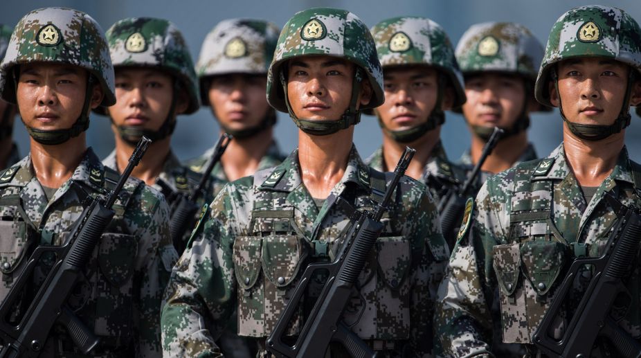 People's Liberation Army soldiers prepare for the arrival of China's President Xi Jinping at a barracks in Hong Kong on June 30, 2017. (AFP Photo)