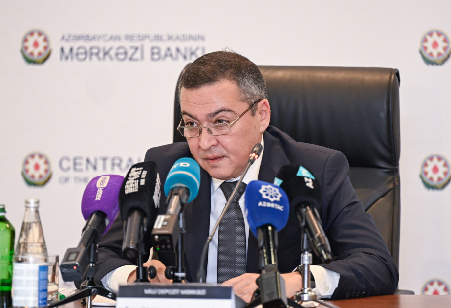 Azerbaijan National Depository Center (NDC) Chairman, Aghahuseyn Hudaverdiyev delivers a speech at a press conference in Baku, Azerbaijan, on Dec. 28, 2024. (Photo via azertag.az)