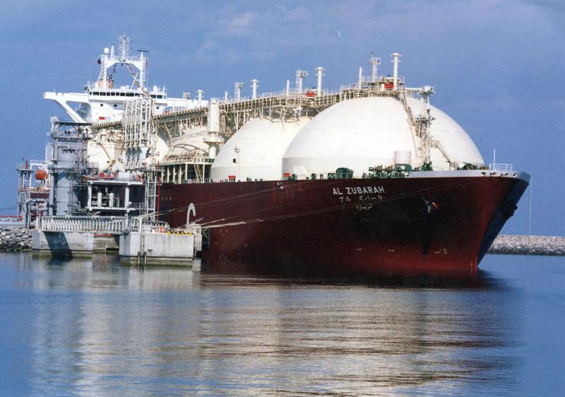 File photo shows a Qatari liquid natural gas (LNG) tanker being loaded up with LNG at Ras Laffan, northern Qatar. (AFP Photo)