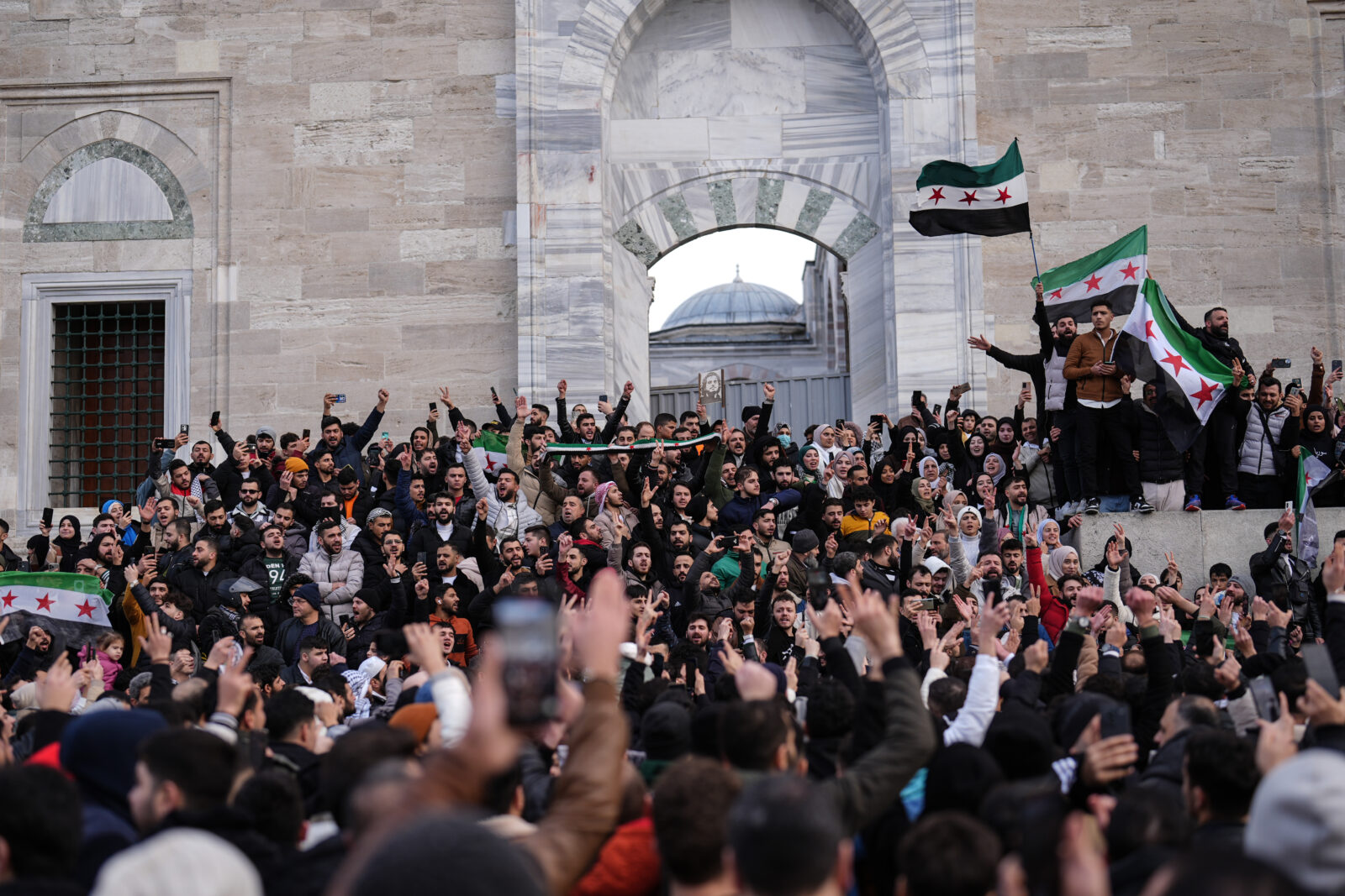 Syrians living in Istanbul celebrate at the courtyard of the Fatih Mosque after the fall of Syrian president Bashar al-Assad, Türkiye, December 8, 2024. (AA Photo)