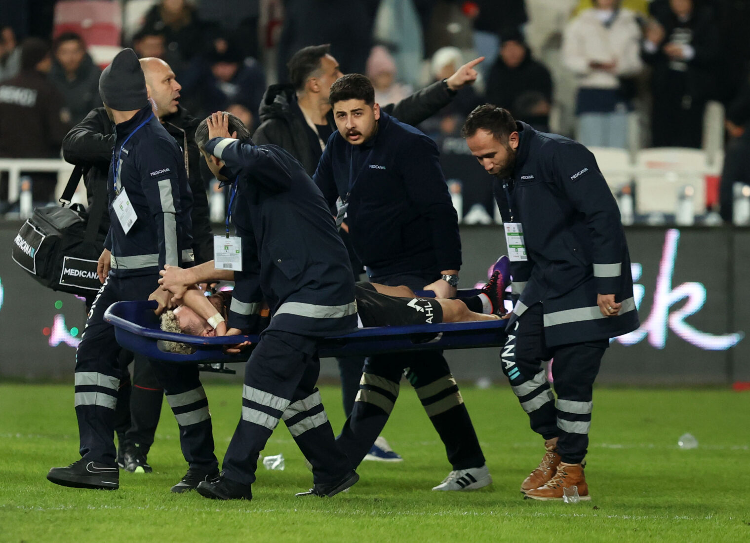 Baris Alper Yilmaz of Galatasaray is being carried with a stretcher after getting injured during the Turkish Super Lig week 15 football match against Sivasspor in Sivas, Türkiye, Dec. 8, 2024. (AA Photo)