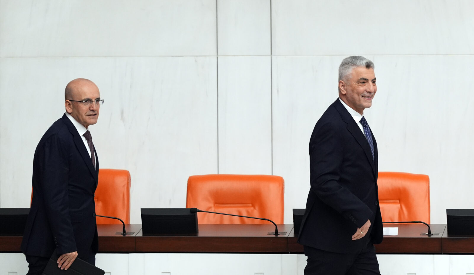 Turkish Finance Minister Mehmet Simsek and Trade Minister Omer Bolat attended discussions on their ministries' 2025 budgets at the Turkish Parliament in Ankara, Türkiye, on Dec. 16, 2024. (AA Photo)