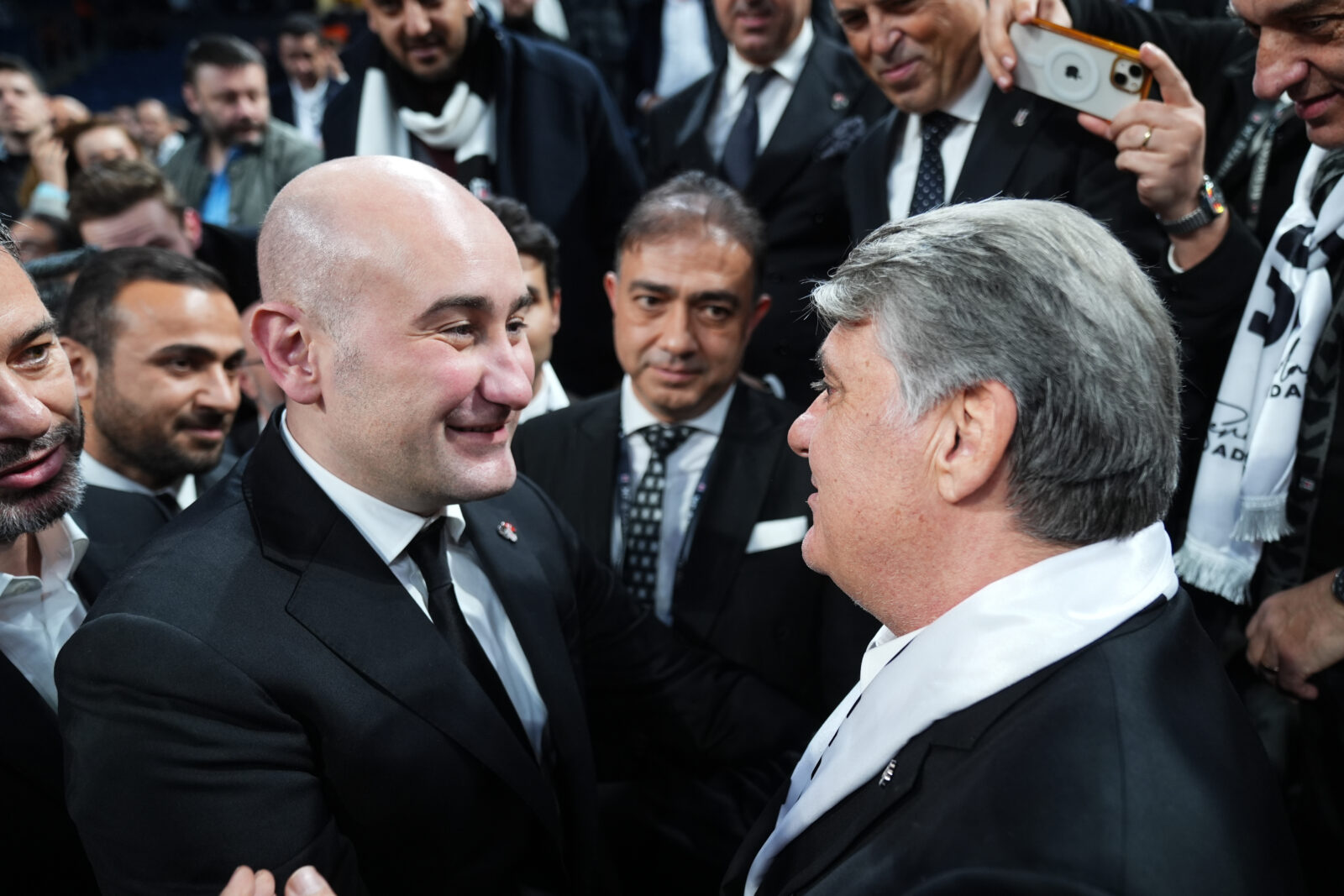 Huseyin Yucel (left) congratulated Serdal Adali as Besiktas Sports Club counted votes at the extraordinary general assembly, Istanbul, Türkiye, December 29, 2024. (AA Photo)