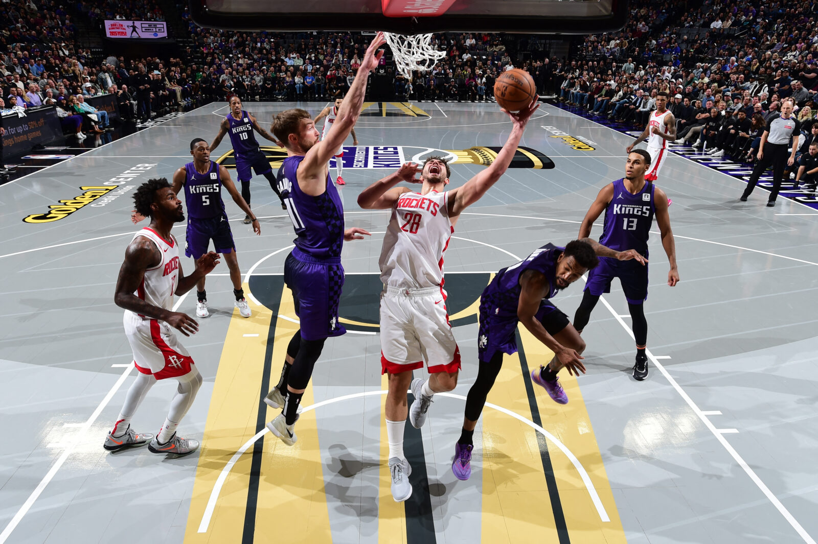 Alperen Sengun #28 of the Houston Rockets drives to the basket during the game against the Sacramento Kings during the Emirates NBA Cup game on December 3, 2024, Sacramento, United States. (AFP Photo)
