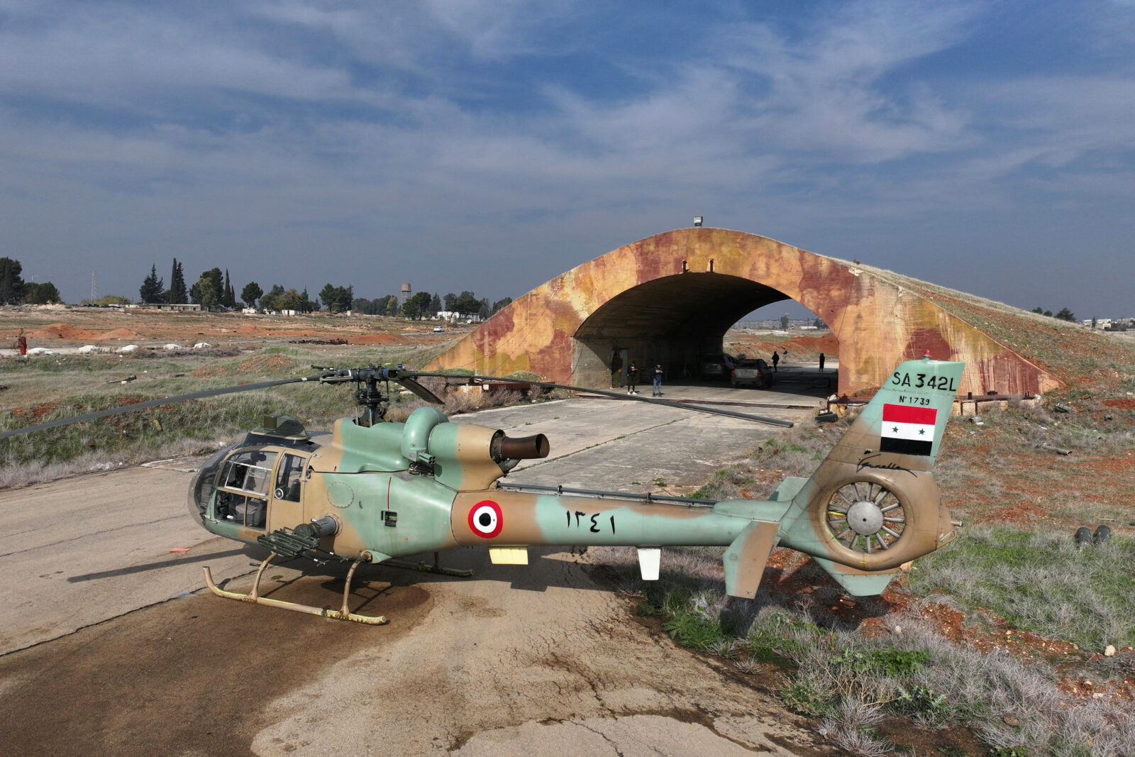 This aerial view shows a helicopter at a Syrian military airbase after anti-government fighters captured it, near the central city of Hama, on Dec. 6, 2024. (AFP Photo)