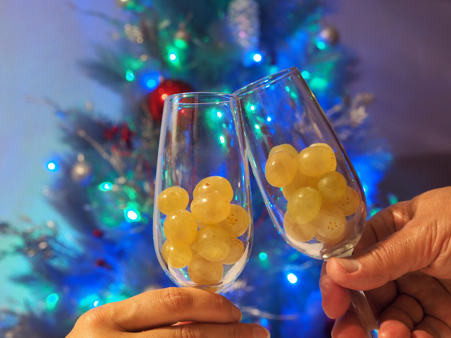 Eating 12 grapes at midnight is one of Spain's cherished New Year’s Eve traditions, symbolizing prosperity for the year ahead. (Adobe Stock Photo)