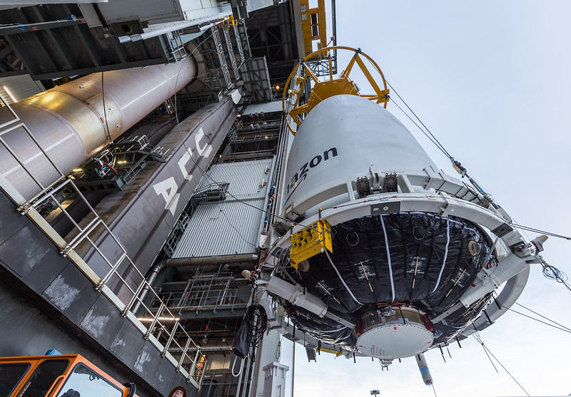 Satellites for Amazon’s Project Kuiper internet constellation are hoisted up to integrate onto ULA’s Atlas 5 rocket. (ULA Photo) 