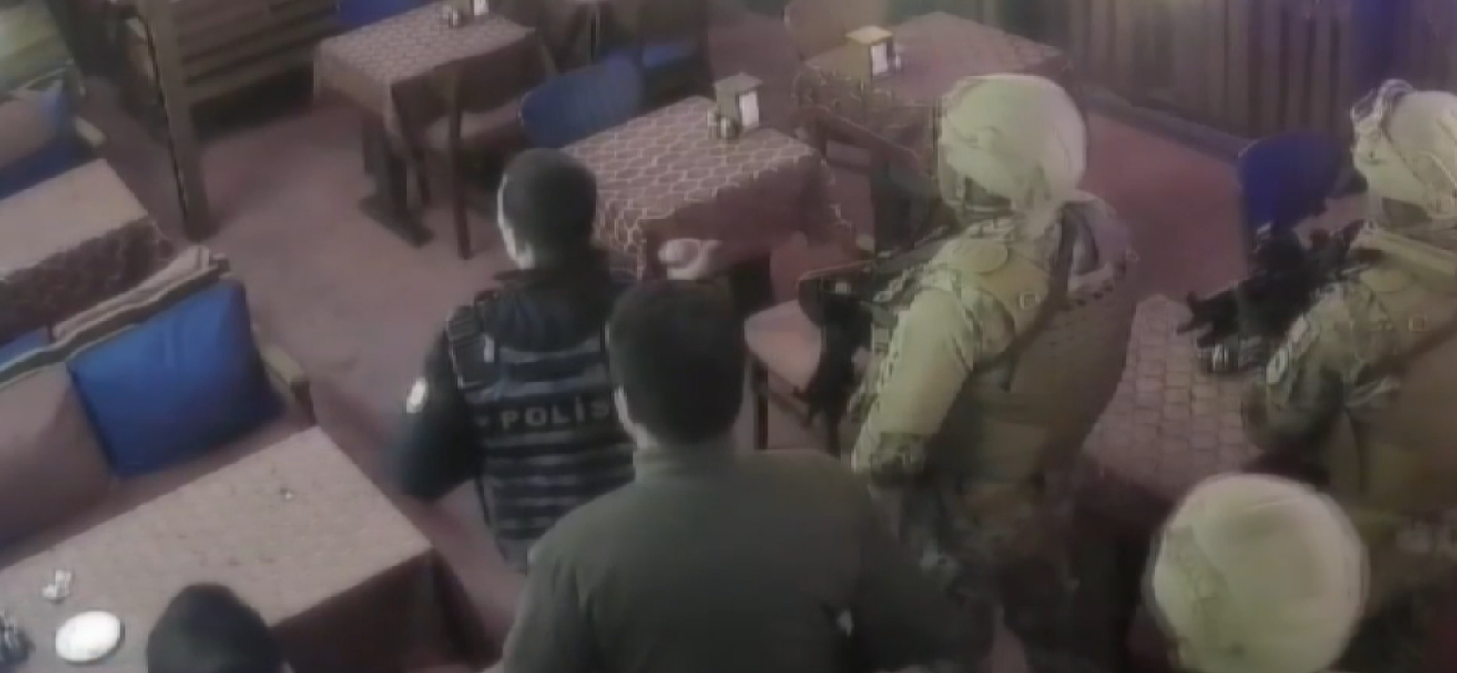 In the security camera footage, police are seen warning the suspect, identified as 21-year-old S.B.S., to drop the knife in his hand, Istanbul, Dec. 9, 2024. (IHA Photo)
