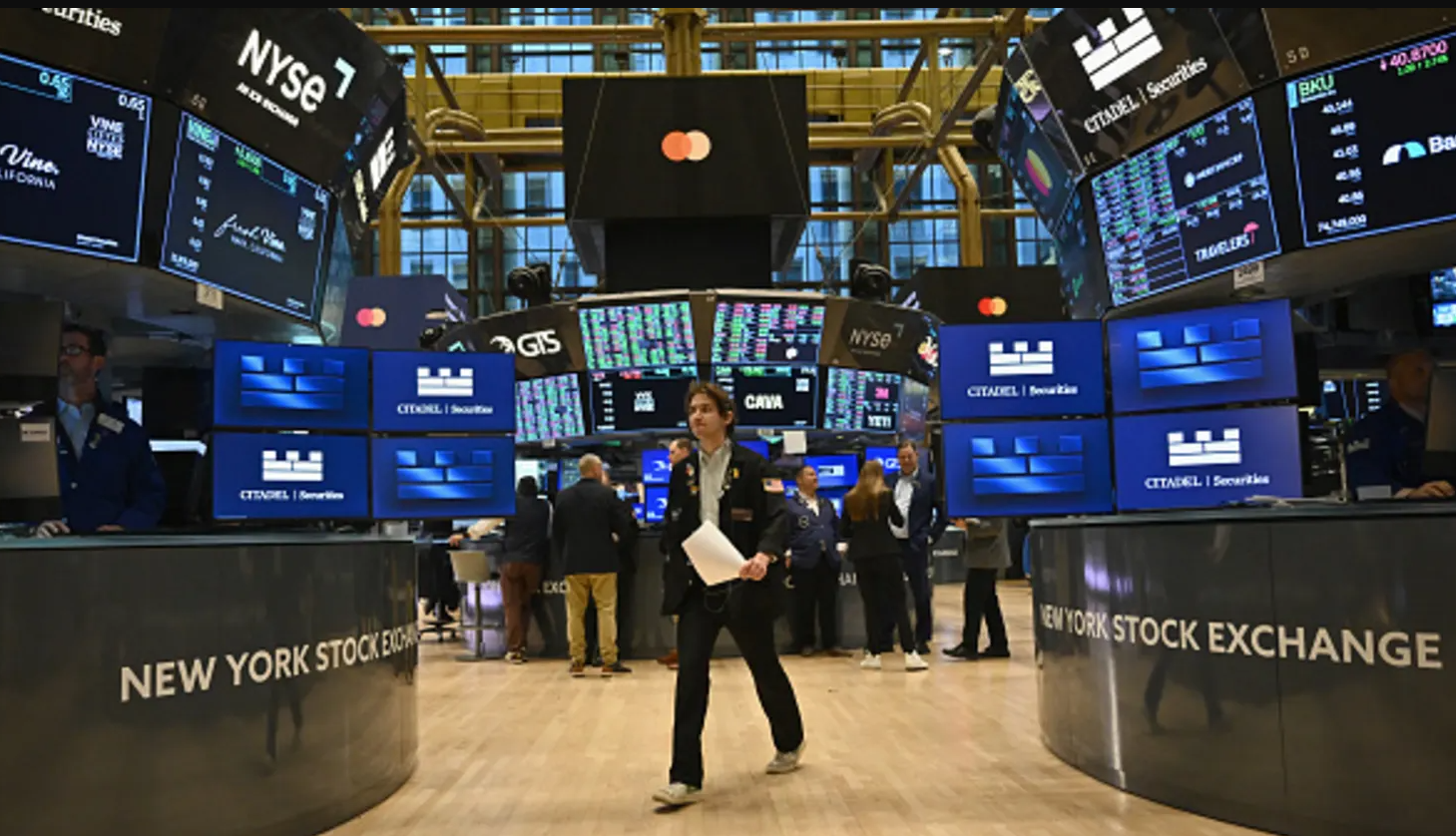 Nasdaq index hits new record with surge of tech stocks
