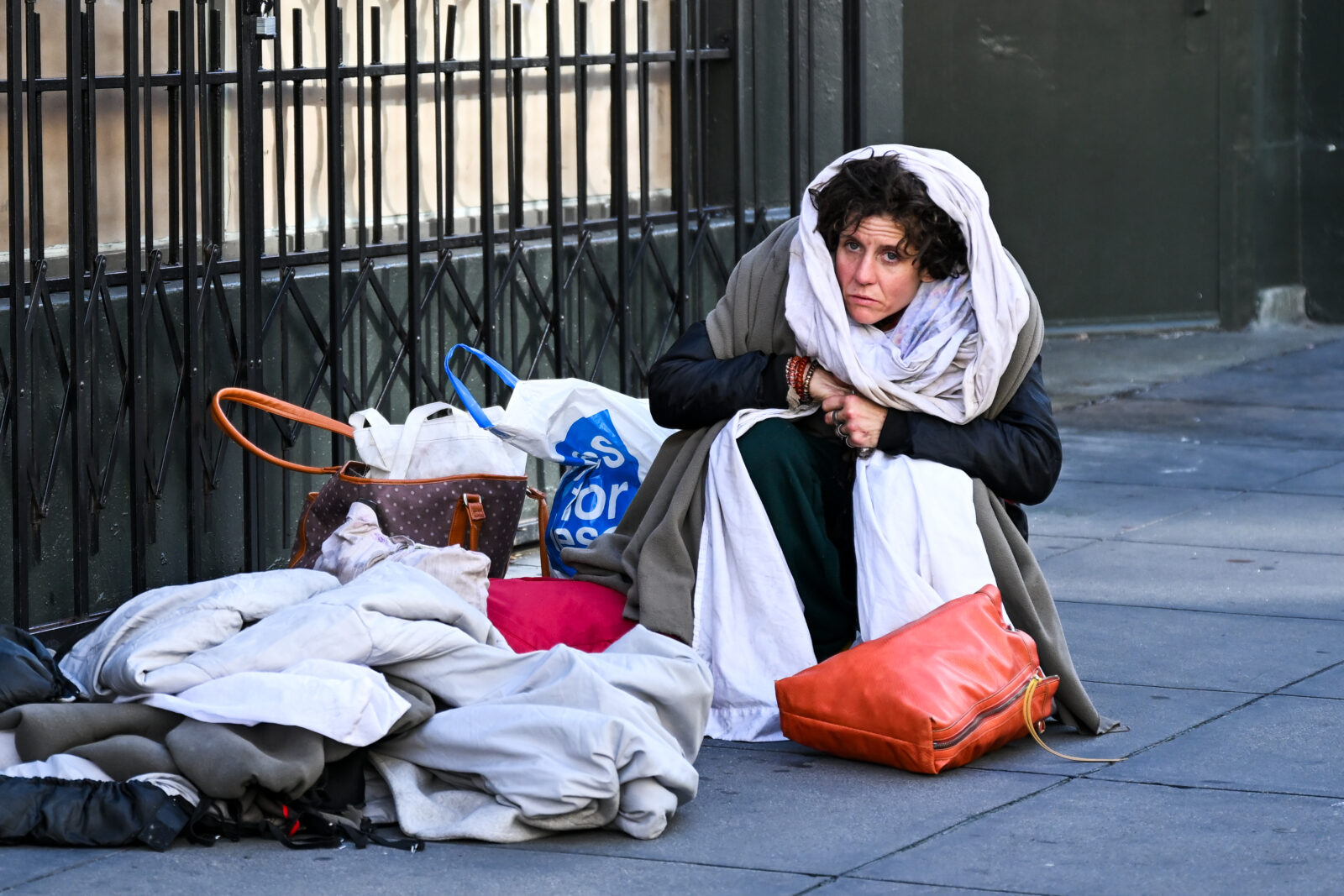 A homeless woman named as Wendy is seen on a sidewalk in Tenderloin district of San Francisco, California, United States, January 3, 2025. (AA Photo)