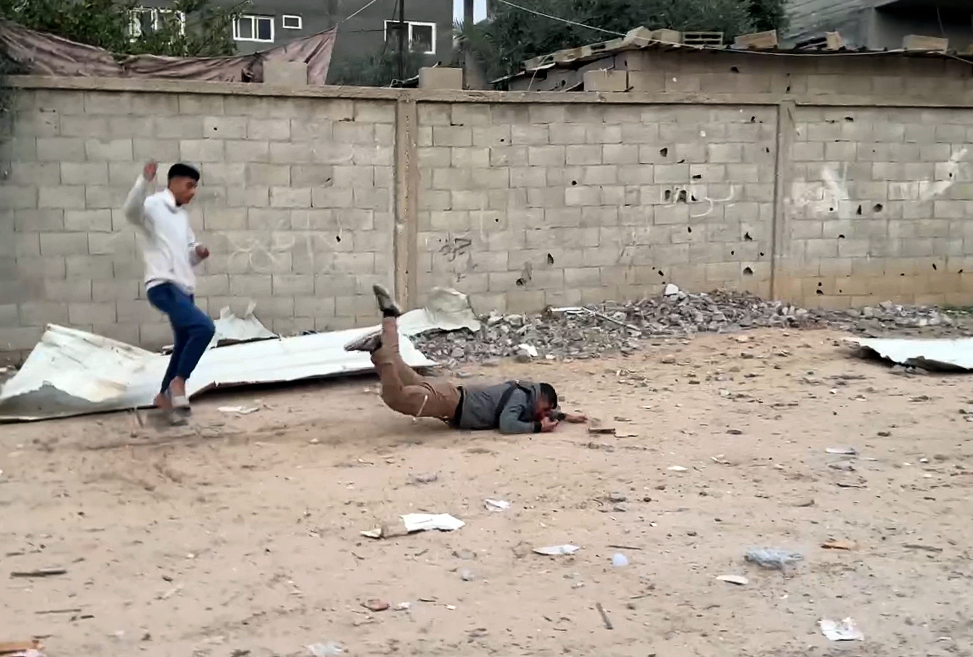 A view of the moment Nabhan was shot dead by an Israeli sniper while on duty in the Nuseirat in central Gaza Strip on January 10, 2025. (AA Photo)
