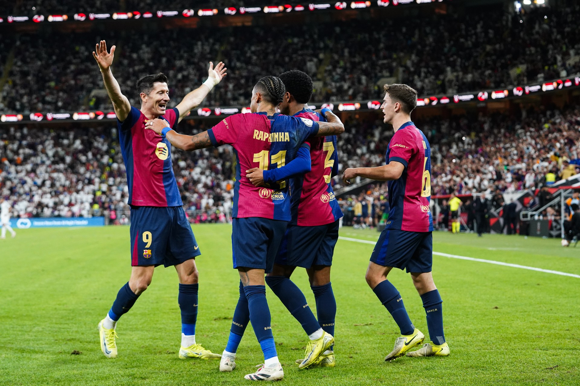 Barcelona thrashes Real Madrid 5-2 to win Super Cup as Ancelotti benches Arda Guler