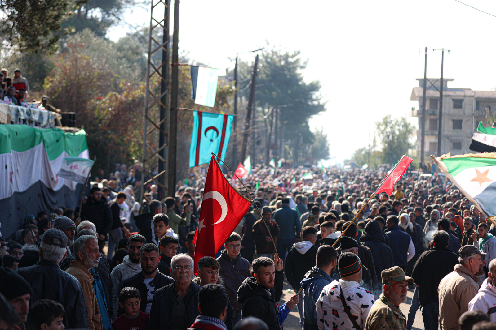 Turkmens celebrate as they return to their villages, which had been blocked by the ousted Bashar al-Assad regime for years in Bayirbucak region in Latakia, Syria on January 17, 2025. (AA Photo)