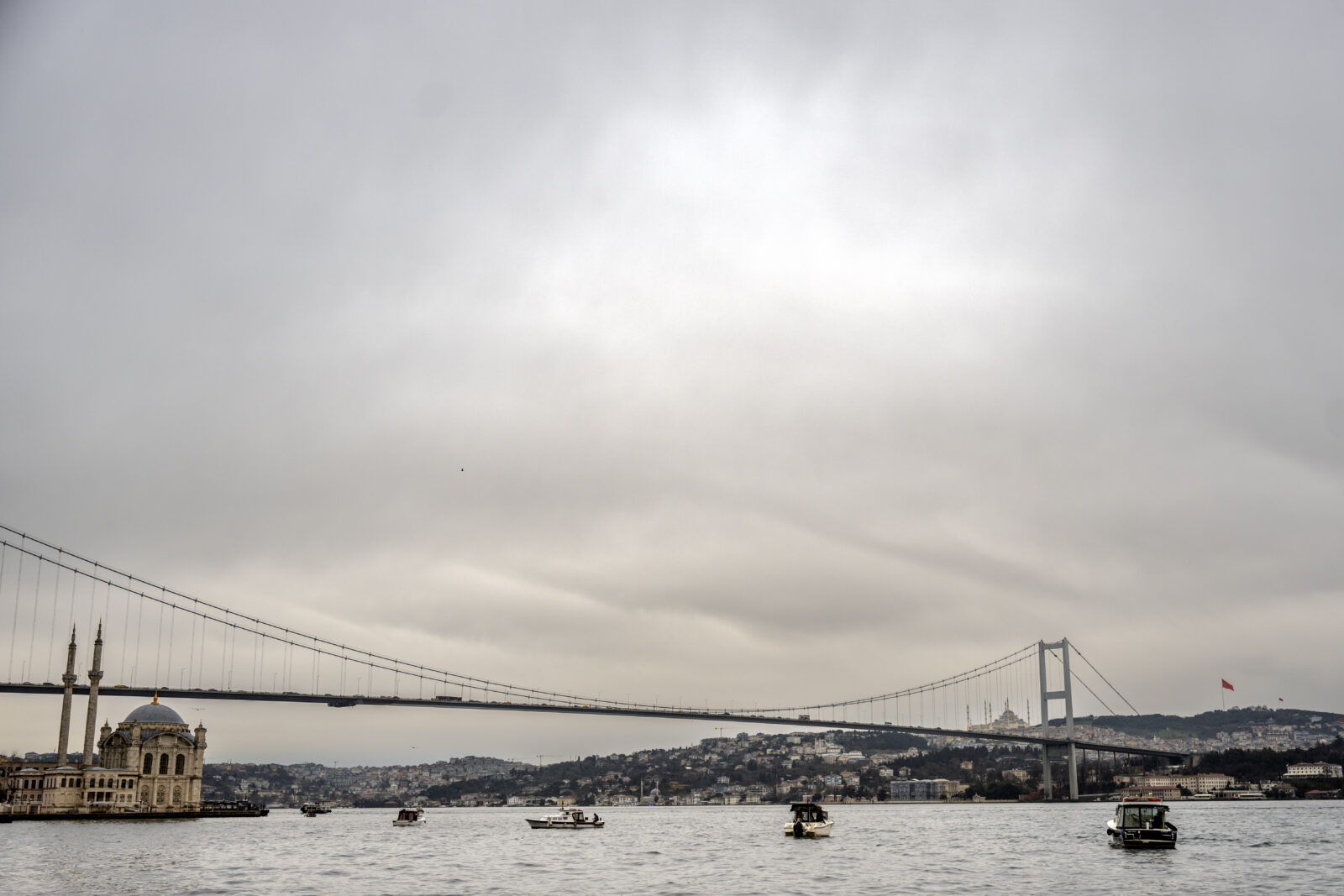 A view of 15 July Bridge and Ortakoy Mosque on a rainy winter day in Istanbul, Türkiye, on Jan. 25, 2025. (AA Photo)