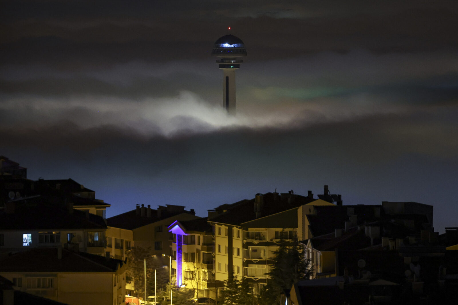 Atakule is seen over the fog clouds as fog blankets the city in the late hours in Ankara, Türkiye on Jan. 28, 2025. (AA Photo)
