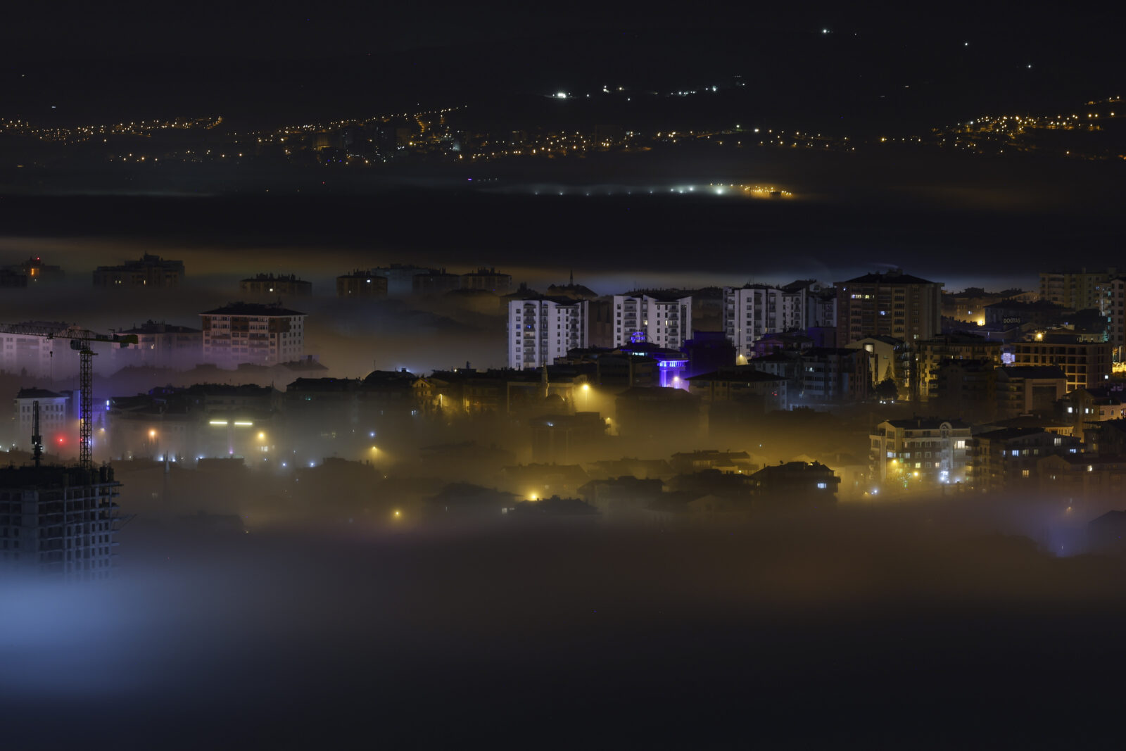 An aerial view of fog blanketing the city in the late hours in Ankara, Türkiye, Jan. 28, 2025. (AA Photo)