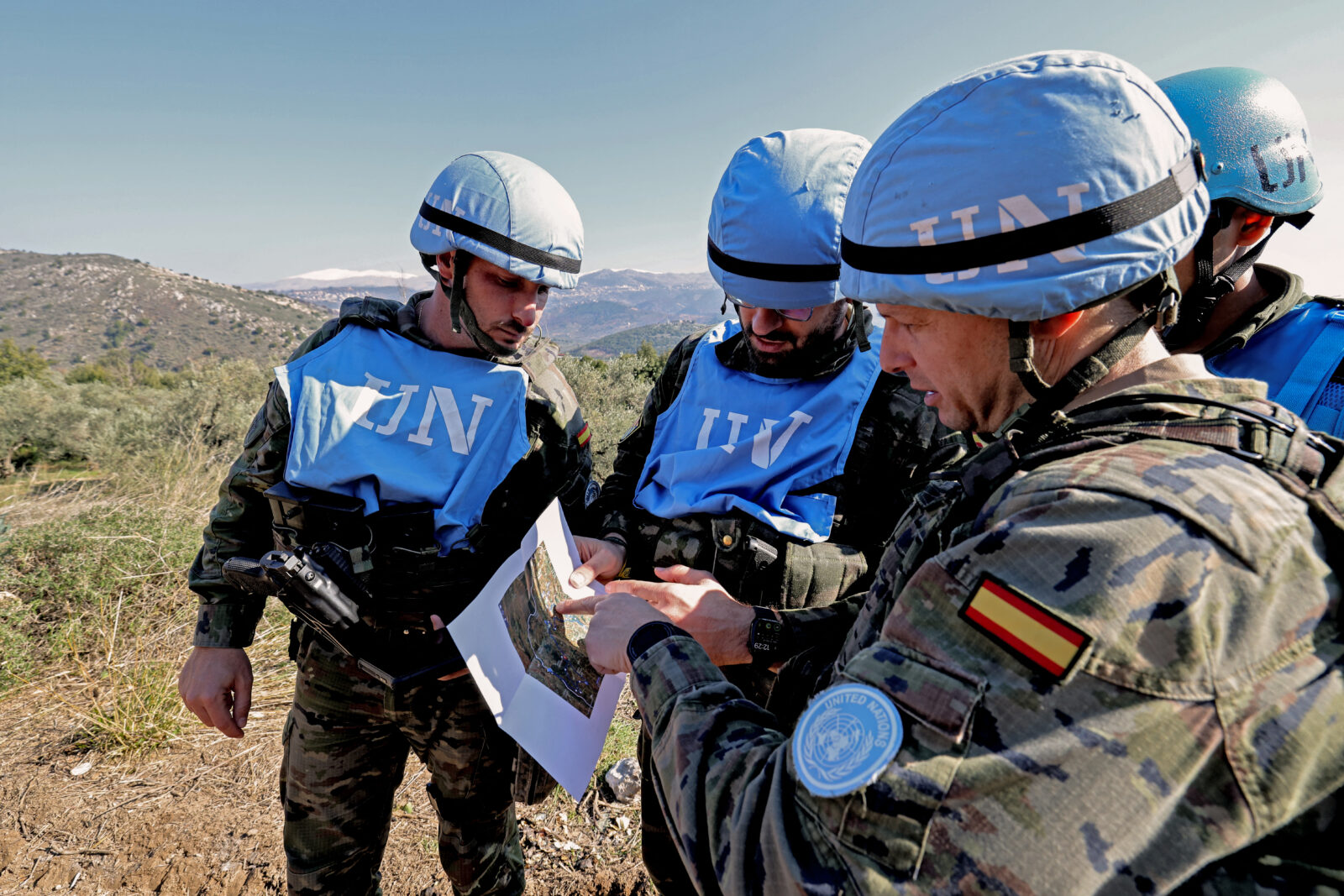 Spanish UNIFIL peacekeepers read a map during a patrol in the southern Lebanese village of Al Mari, near the border with Israel, on January 7, 2025, (AFP Photo)