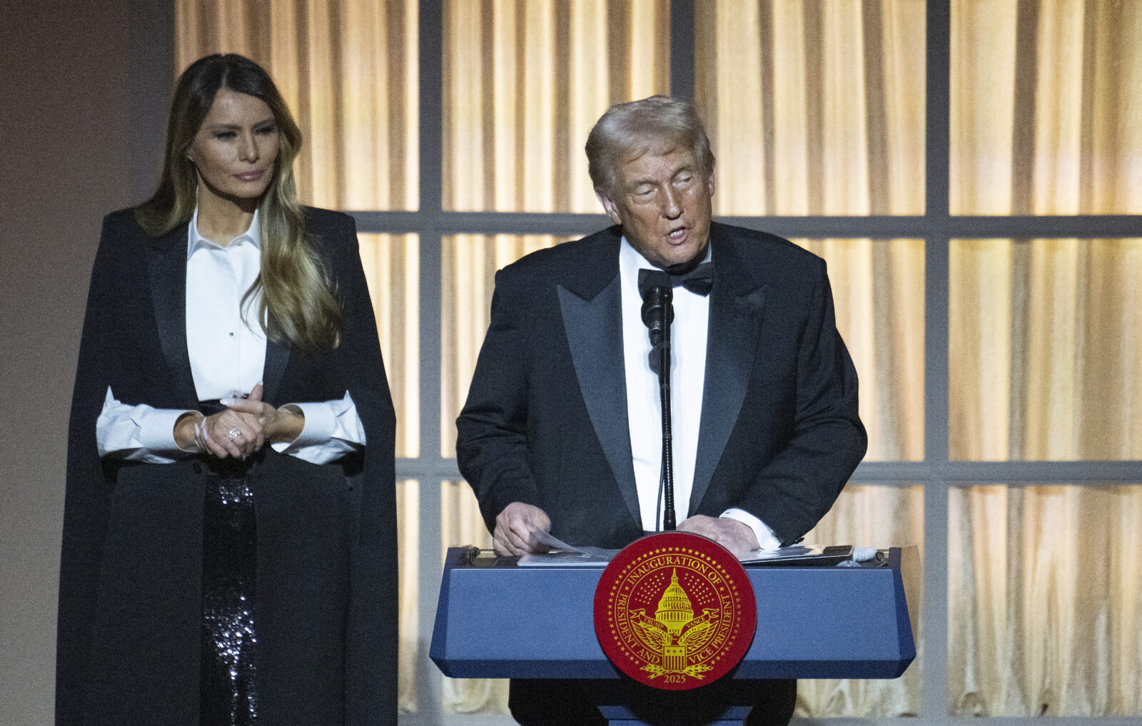 Melania Trump watches her husband, U.S. President-elect Donald Trump, speak at a candlelight dinner a day before his inauguration ceremony at the National Building Museum in Washington, D.C., on Jan. 19, 2025. (AFP Photo)