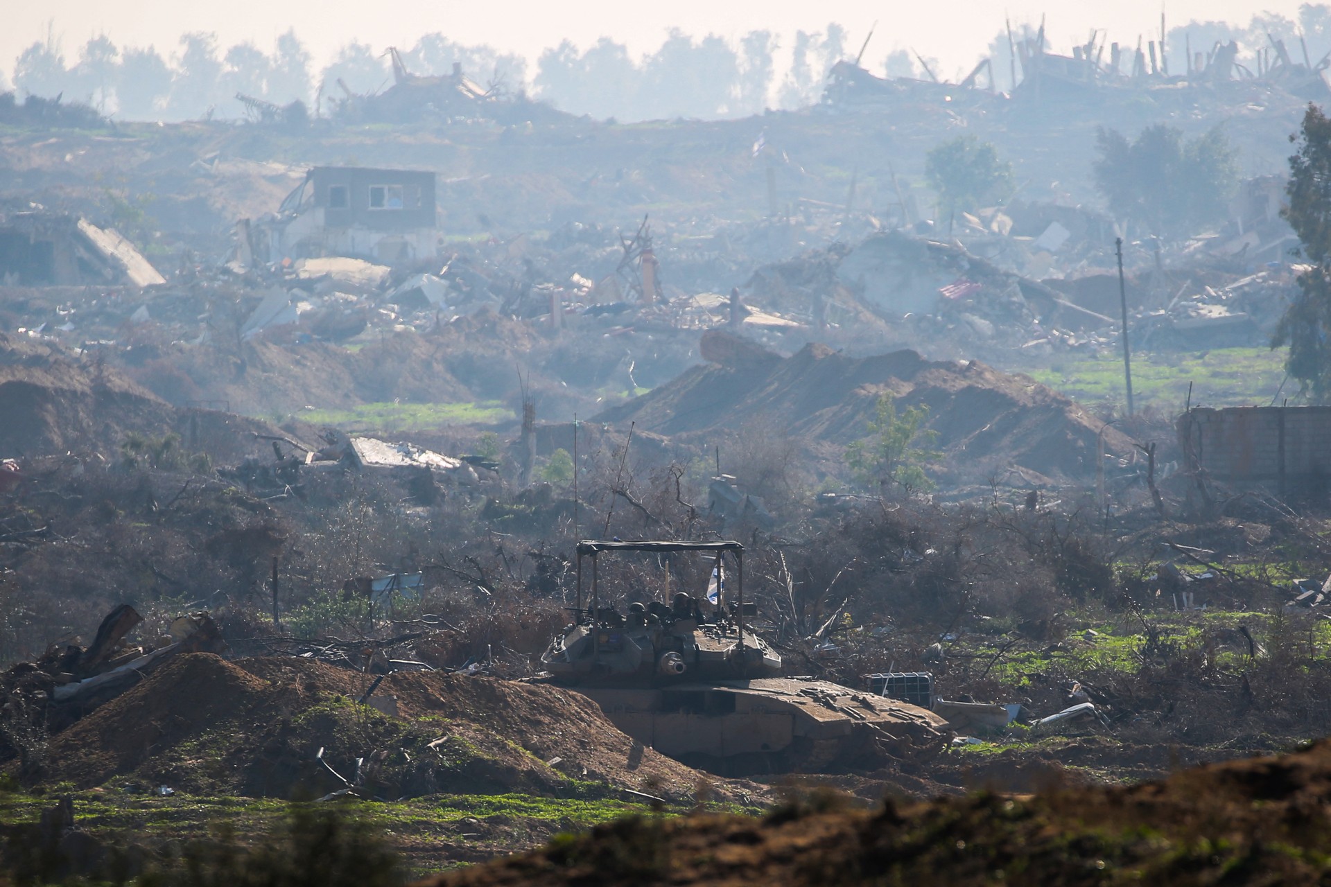 Israel pulls troops from Gaza belt amid cease-fire uncertainty