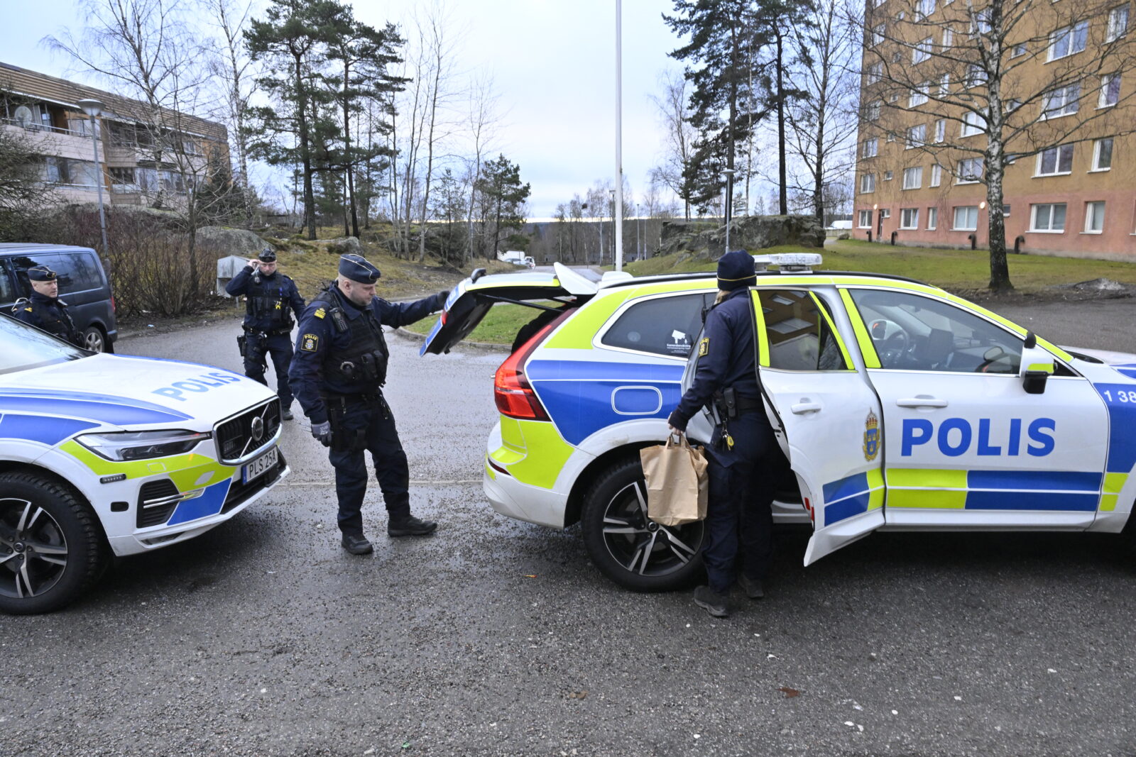 Policemen stand next to their cars in front of an apartment building in Södertälje, south of Stockholm, Sweden, on January 30, 2025 (AFP Photo)
