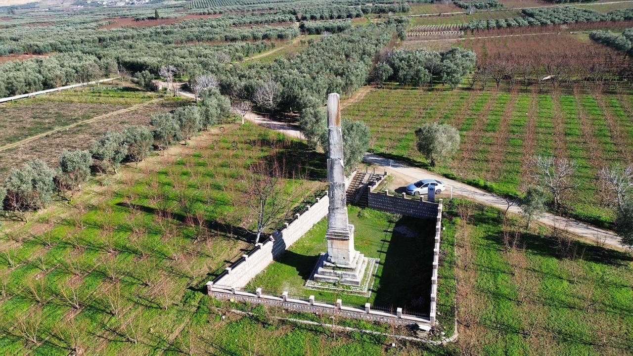 A 2,000-year-old Roman-era tomb monument, the obelisk in Iznik, Bursa, stands amidst peach orchards, Türkiye, January 21, 2025. (IHA Photo)