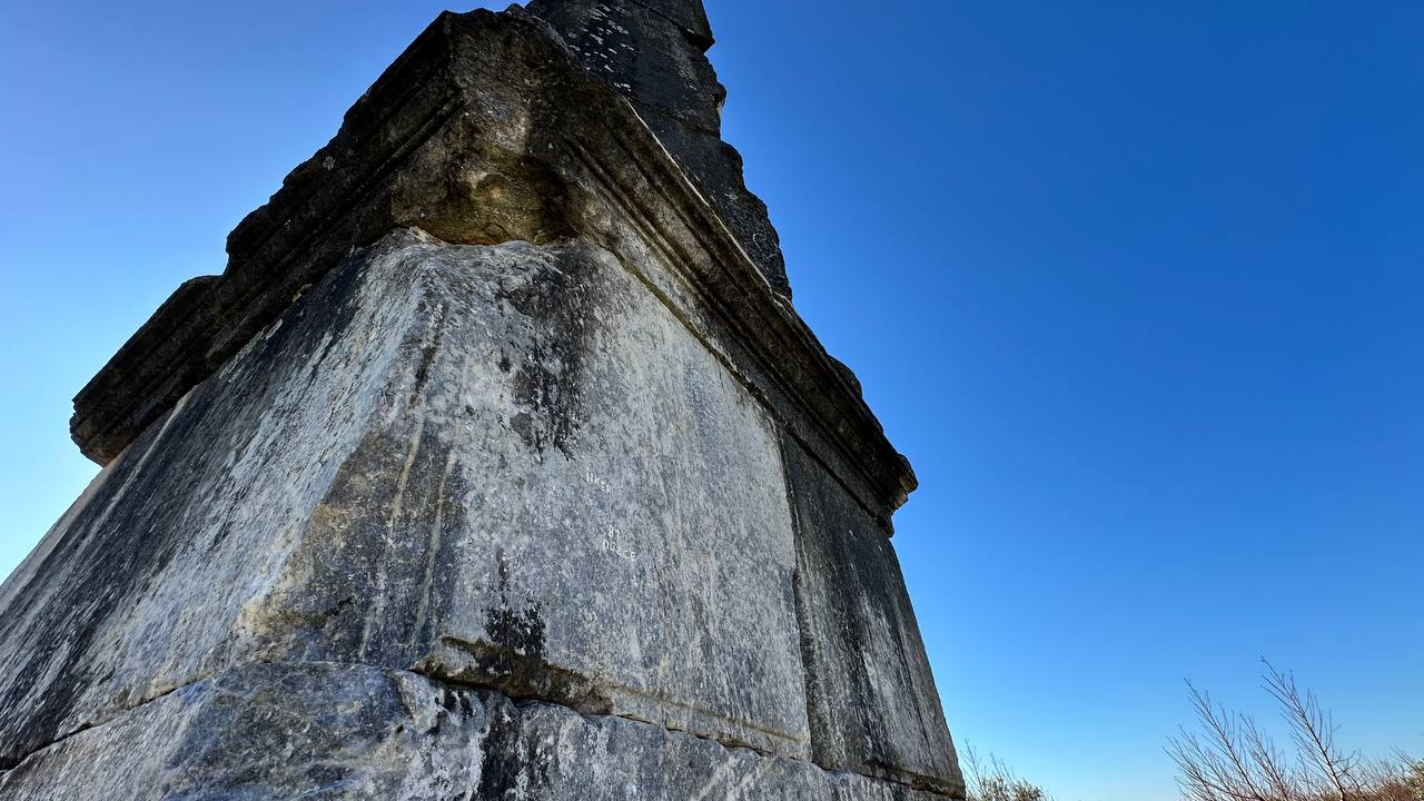 A 2,000-year-old Roman-era tomb monument, the obelisk in Iznik, Bursa, stands amidst peach orchards, Türkiye, January 21, 2025. (IHA Photo)