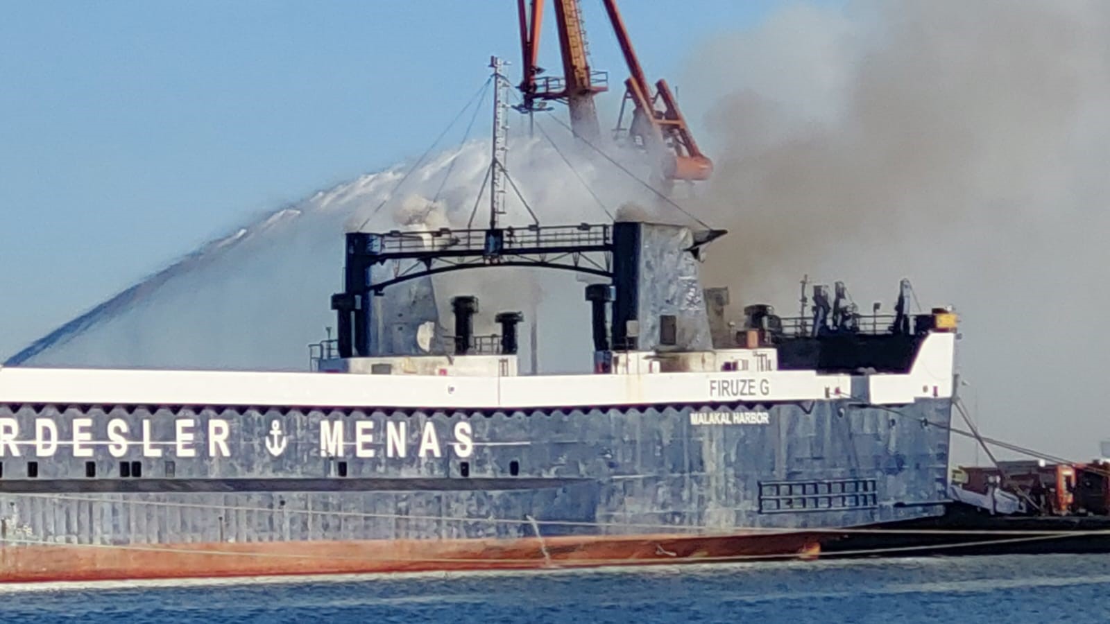 A fire on a ship at Samsun Port, which is brought under control by teams, Samsun, Türkiye, Jan. 28, 2025 (IHA Photo)
