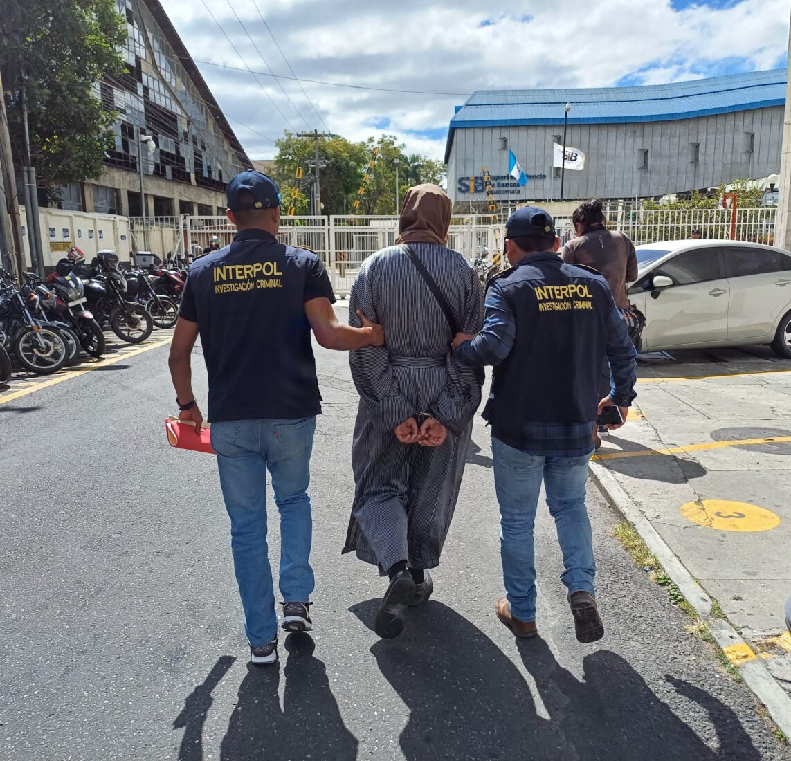 Yoel Alter, one of the leaders of the Lev Tahor Jewish sect, which has been accused of child abuse and human trafficking in Guatemala, has been arrested. It is seen that Interpol officers are escorting him, Jan. 29, 2025. (IHA Photo)