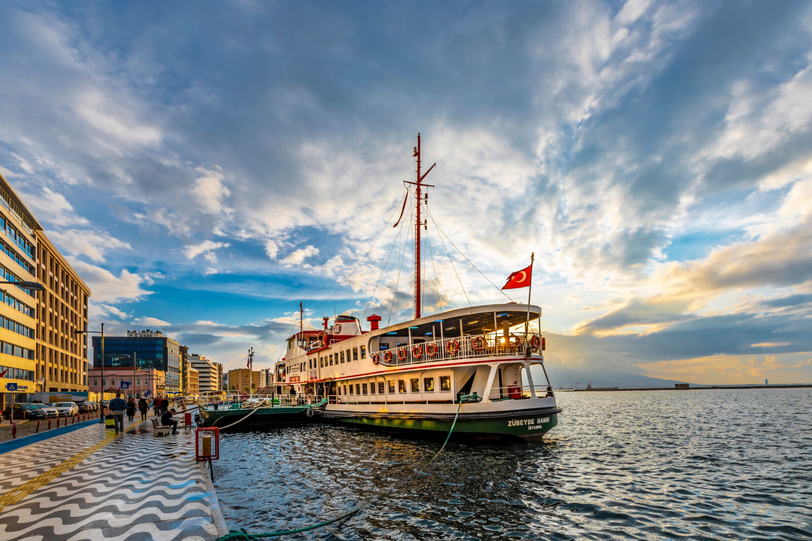 A ferry docked at Izmir’s Kordon, known as Türkiye’s historic coastal city, Izmir, Türkiye. (Adobe Stock Photo)