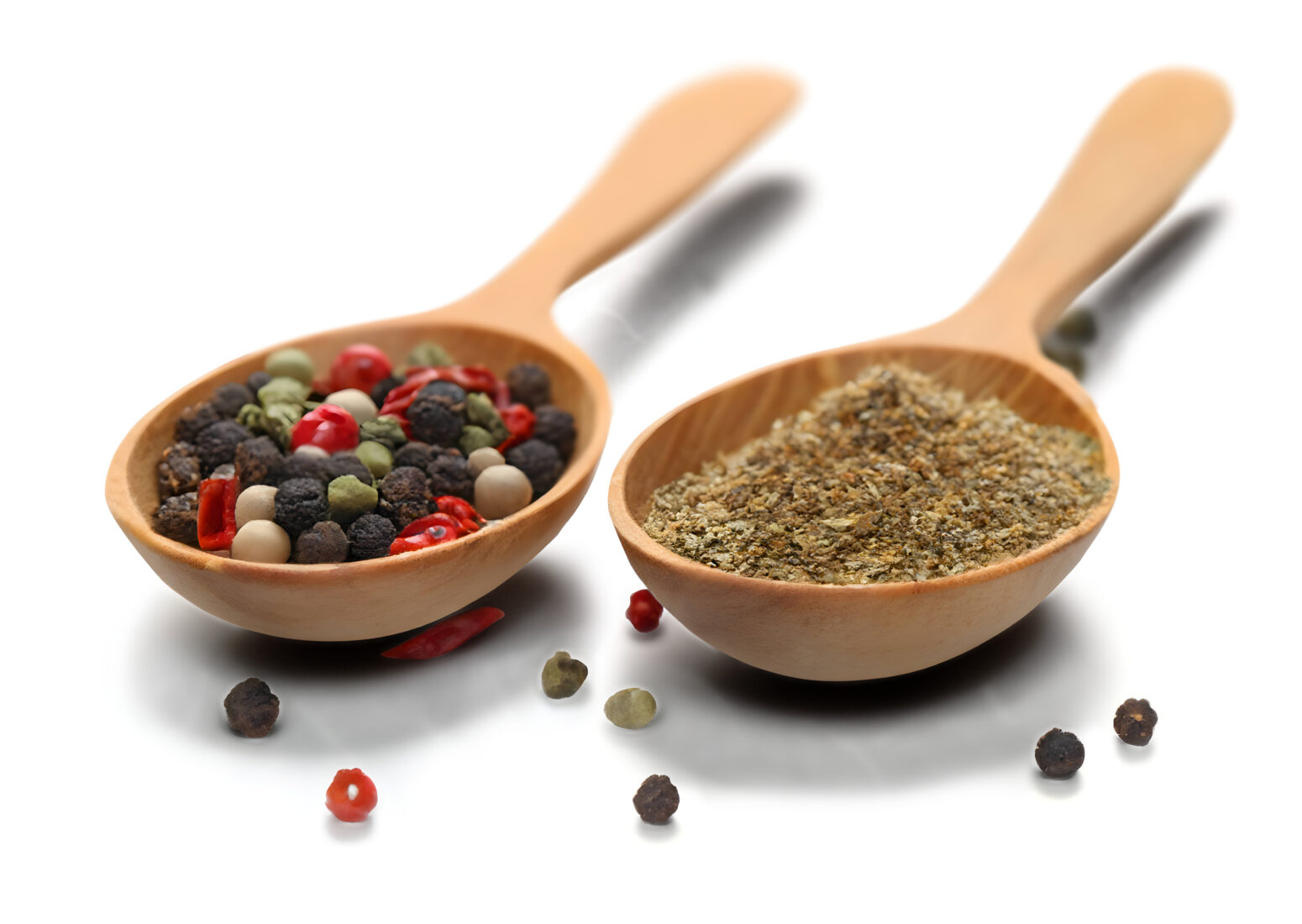 Spices in two wooden spoon. (Adobe Stock Photo)