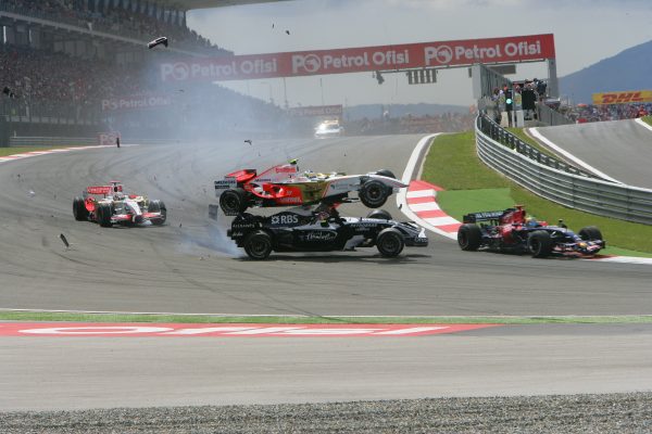 Giancarlo Fisichella (Force India) flying over Kazuki Nakajima (Williams F1) in the first corner at the start of 2008 Turkish Grand Prix, Istanbul, Türkiye. (Photo via Wikimedia)