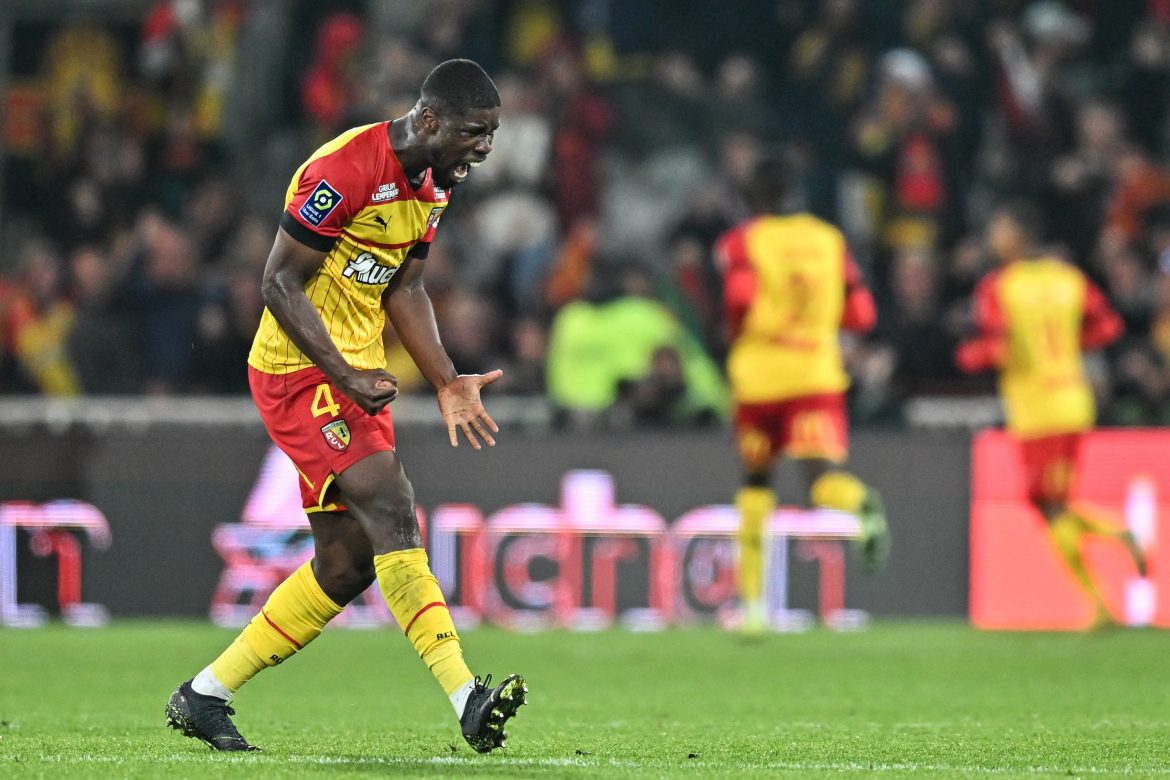 Lens' Austrian defender Kevin Danso celebrates a team goal during the French L1 football match between RC Lens and Olympique Lyonnais at Stade Bollaert-Delelis in Lens, northern France on Oct. 2, 2022. (AFP Photo)