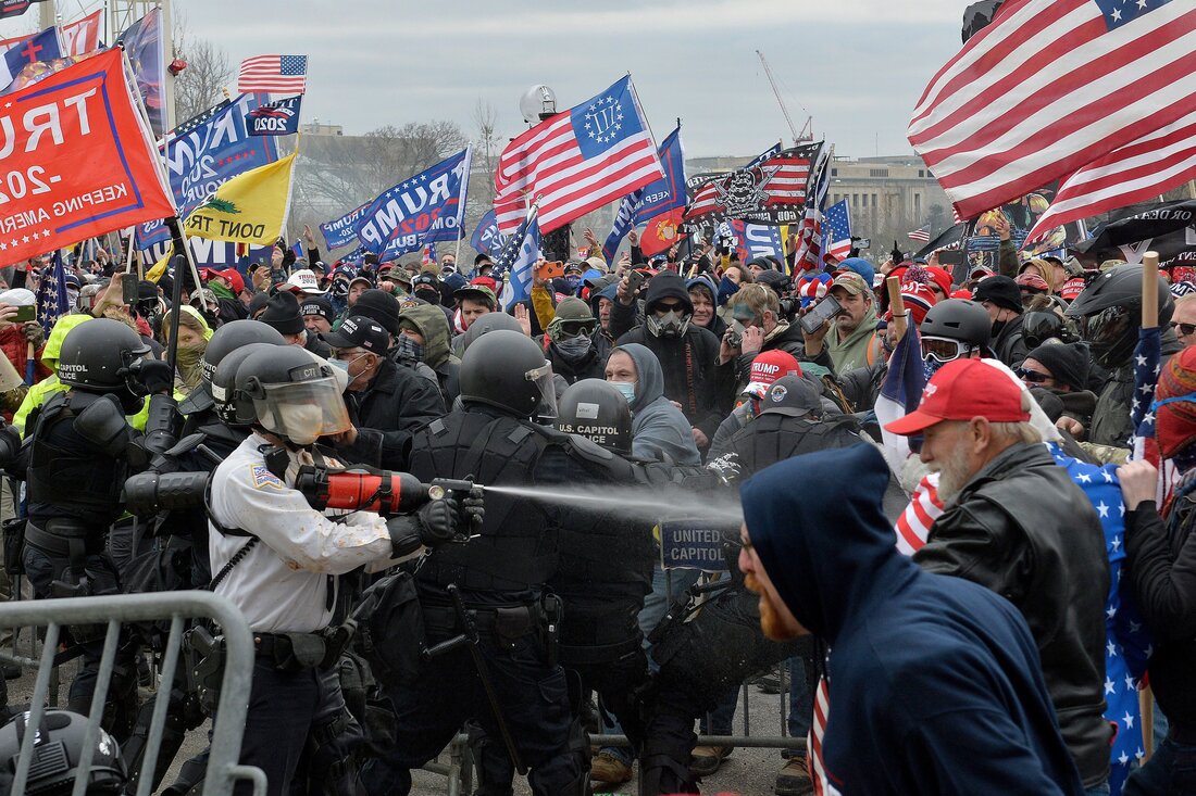 Trump supporters clash with police and security forces as they try to storm the US Capitol in Washington, DC on January 6, 2021. - Demonstrators breeched security and entered the Capitol as Congress debated the a 2020 presidential election Electoral Vote Certification. (Photo by Joseph Prezioso / AFP) (Photo by JOSEPH PREZIOSO/AFP via Getty Images)