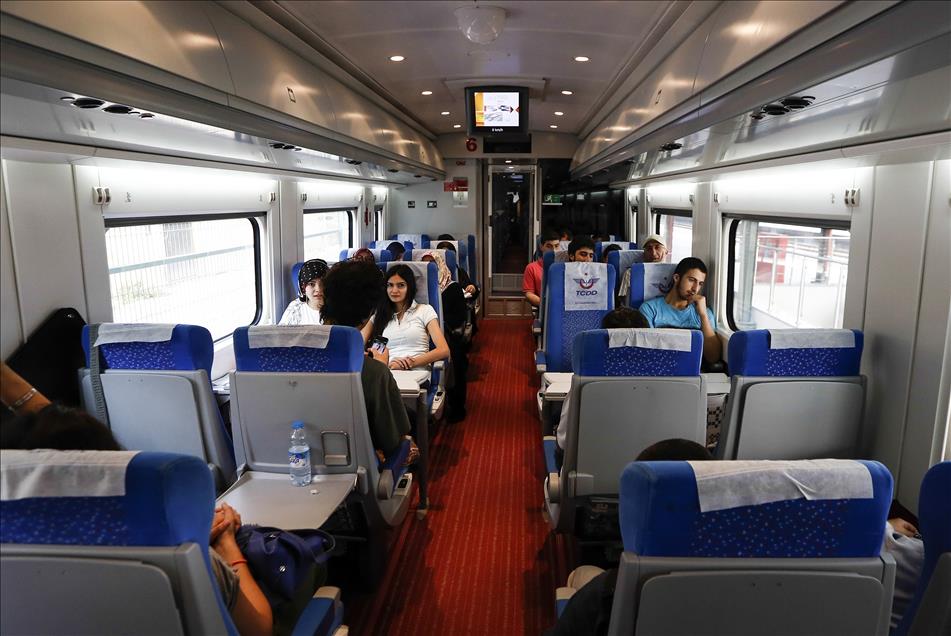 Passengers travel inside the Ankara-Istanbul High-Speed Train (YHT). (AA Photo)
