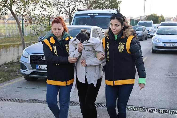Woman who bit and stabbed her husband while he was driving a minibus was arrested, Adana, Türkiye, Jan. 9, 2024. (IHA Photo)