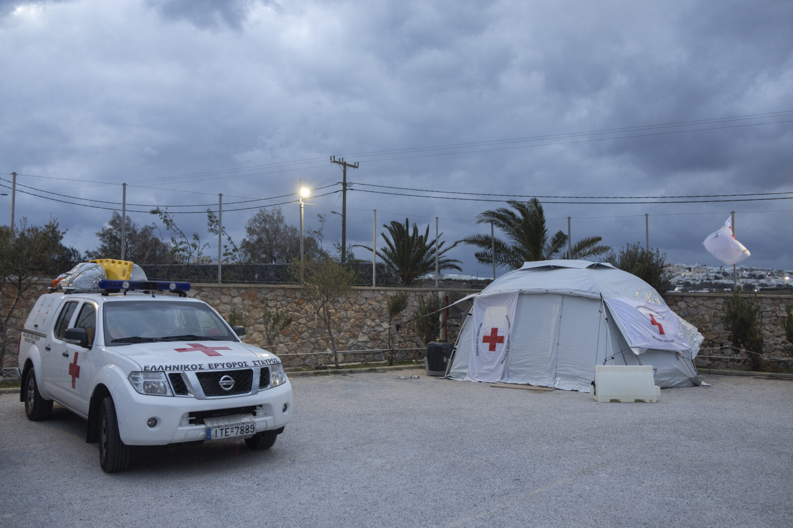 A Red Cross vehicle, a rescue dog, and a tent deployed as part of the civil protection emergency response in Santorini, Greece, Feb. 21, 2025. (AA Photo)