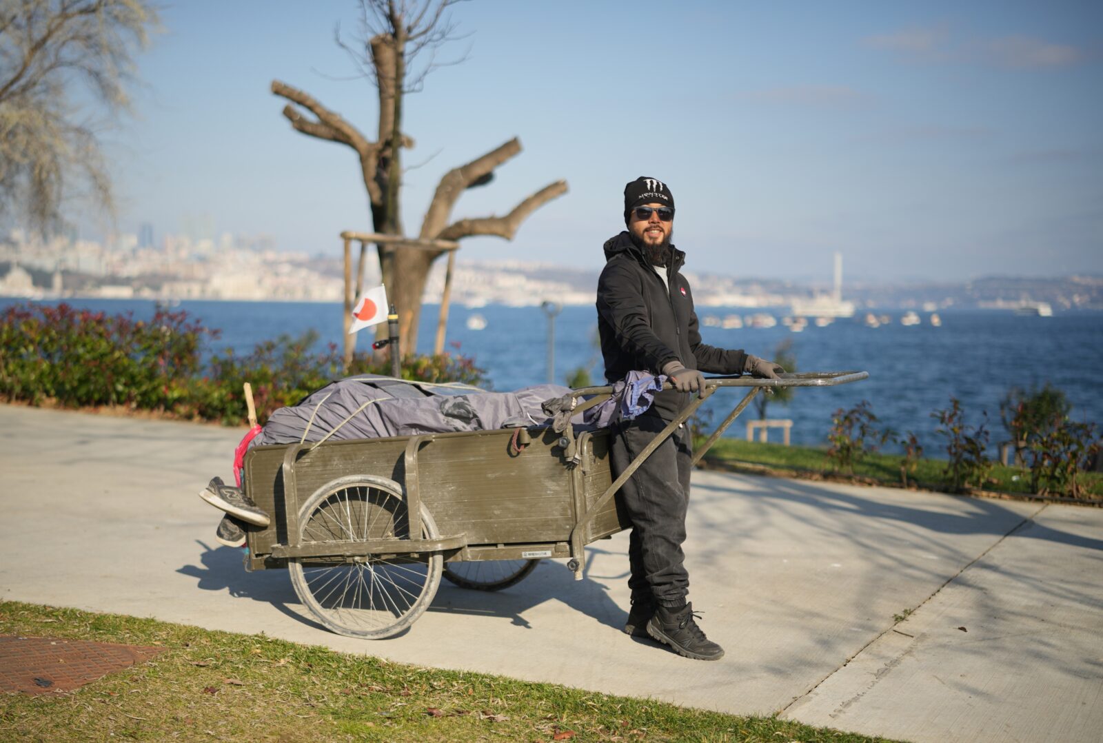 Japanese traveler Motoki Sato, who started his thousands-of-kilometers journey with a 