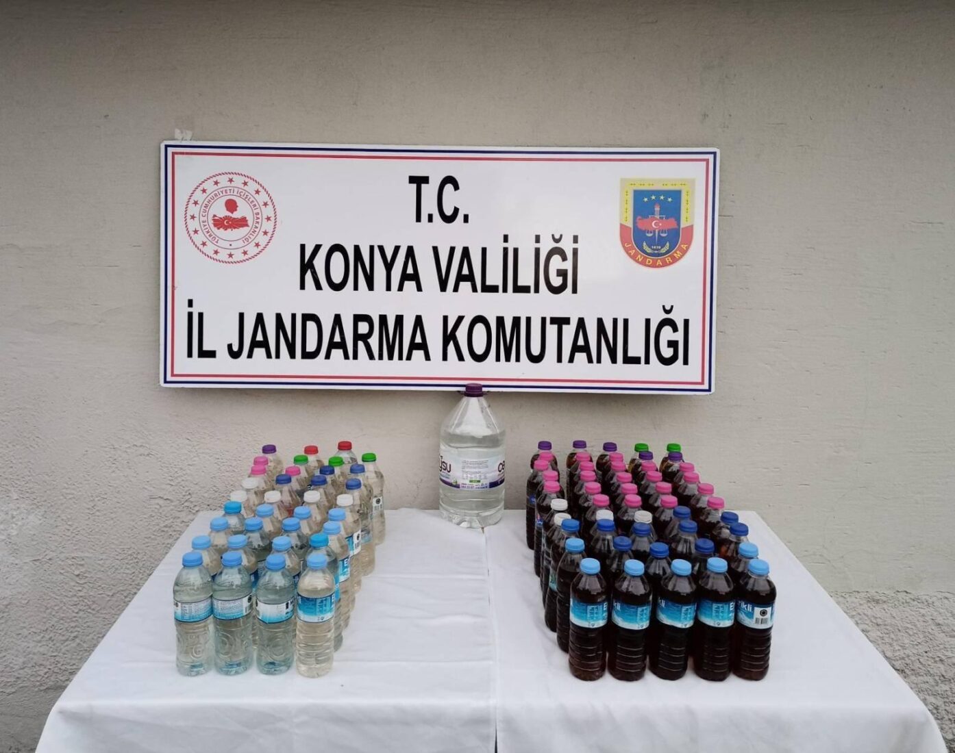 Authorities in Konya's Eregli district apprehended a suspect selling counterfeit alcohol and confiscated 46.5 liters in two separate raids, Konya, Türkiye, Jan. 31, 2025. (AA Photo)