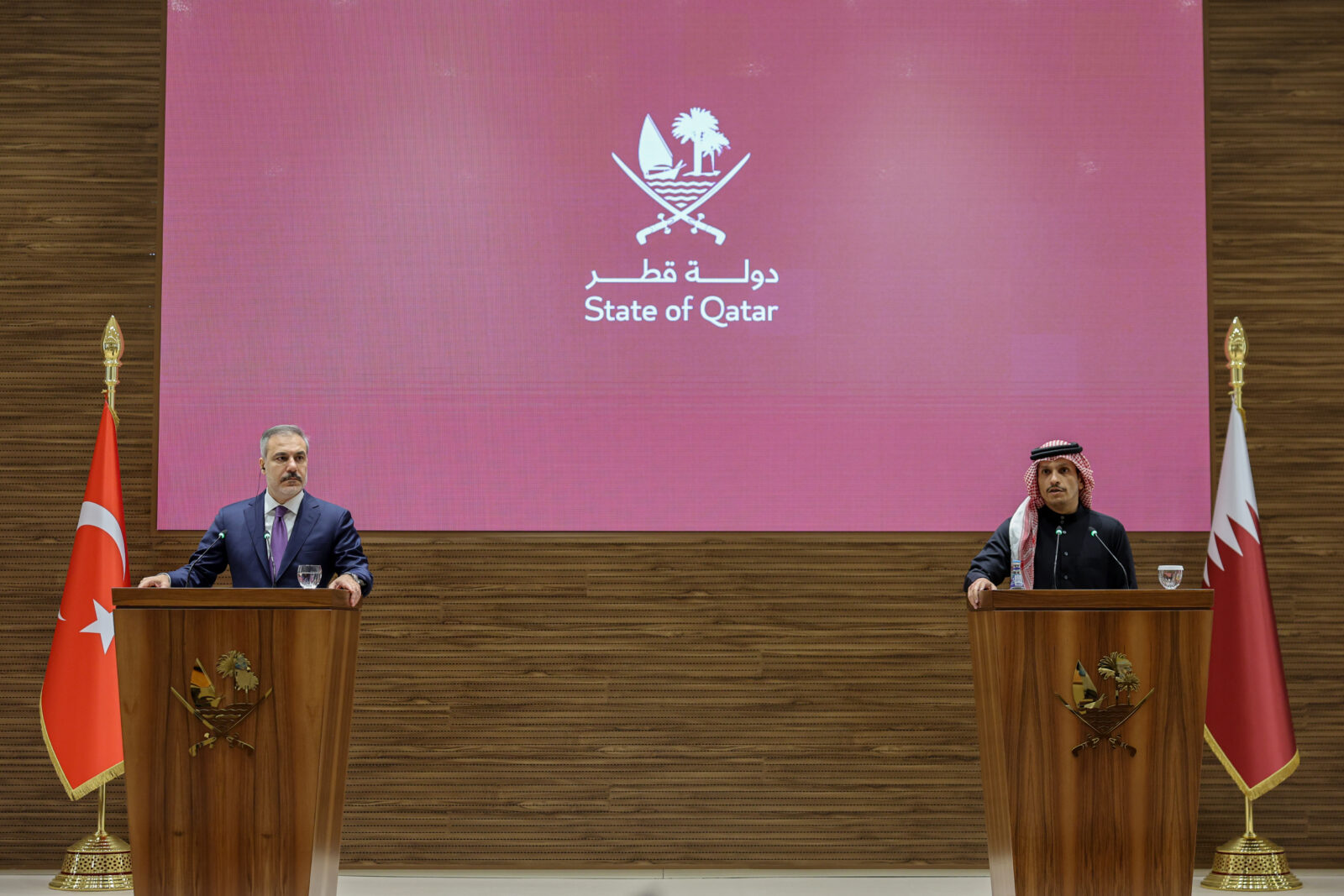 Foreign Minister Hakan Fidan (L) and Qatari Prime Minister and Foreign Minister Mohammed bin Abdulrahman bin Jassim Al Thani (R) hold a joint press conference following their meeting in Doha, Qatar, Feb. 02, 2025. (AA Photo)