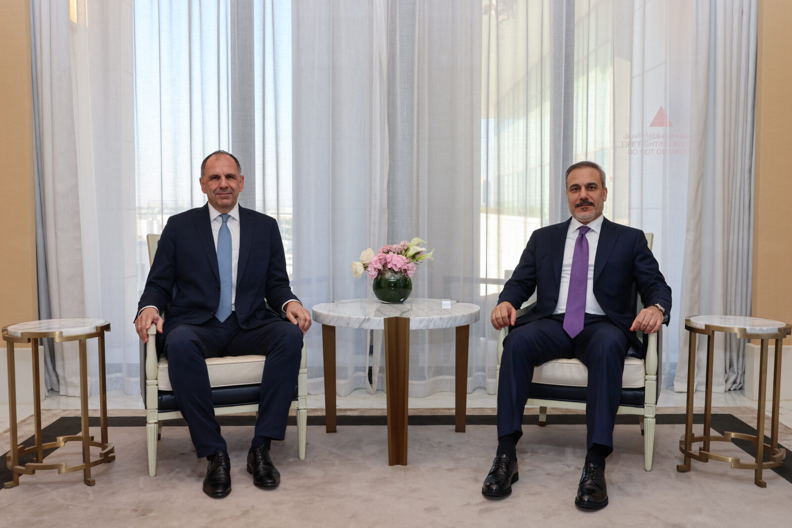 Turkish Foreign Minister Hakan Fidan (R) meets with Greek Foreign Minister George Gerapetritis (L) in Doha, Qatar on Feb. 2, 2025. (AA Photo)