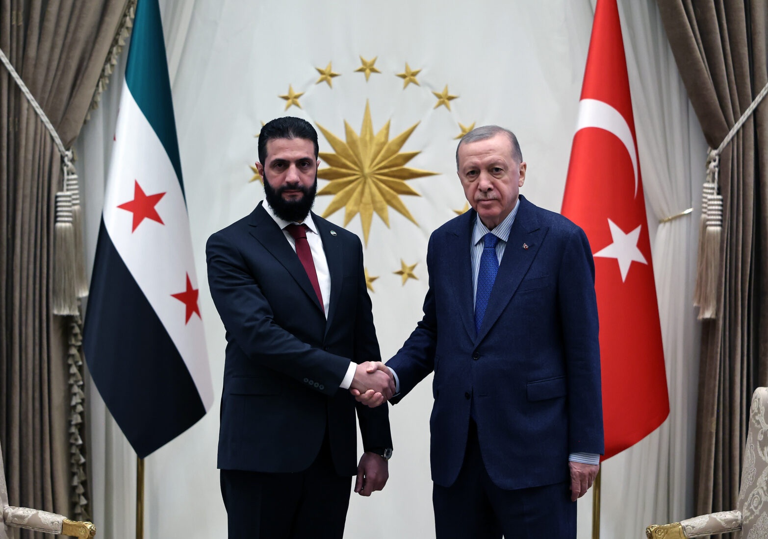 President Recep Tayyip Erdogan (R) receives Syria's interim President Ahmad al-Sharaa (L) for a meeting at the Presidential Complex in Ankara, Türkiye, Feb. 04, 2025. (AA Photo)