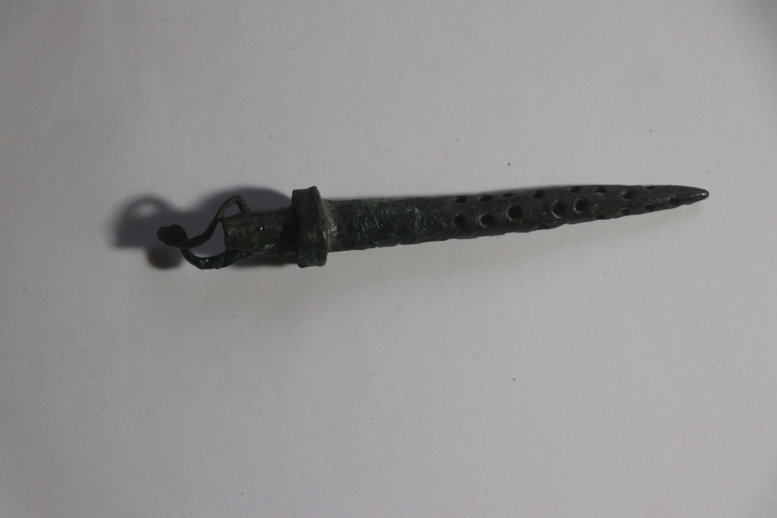 A bronze object believed to date back to the fifth century A.D. and used as a drinking filter has been found during excavation works at the Hadrianopolis Ancient City in the Eskipazar district of Karabuk, Türkiye, Feb. 8, 2025. (AA Photo)