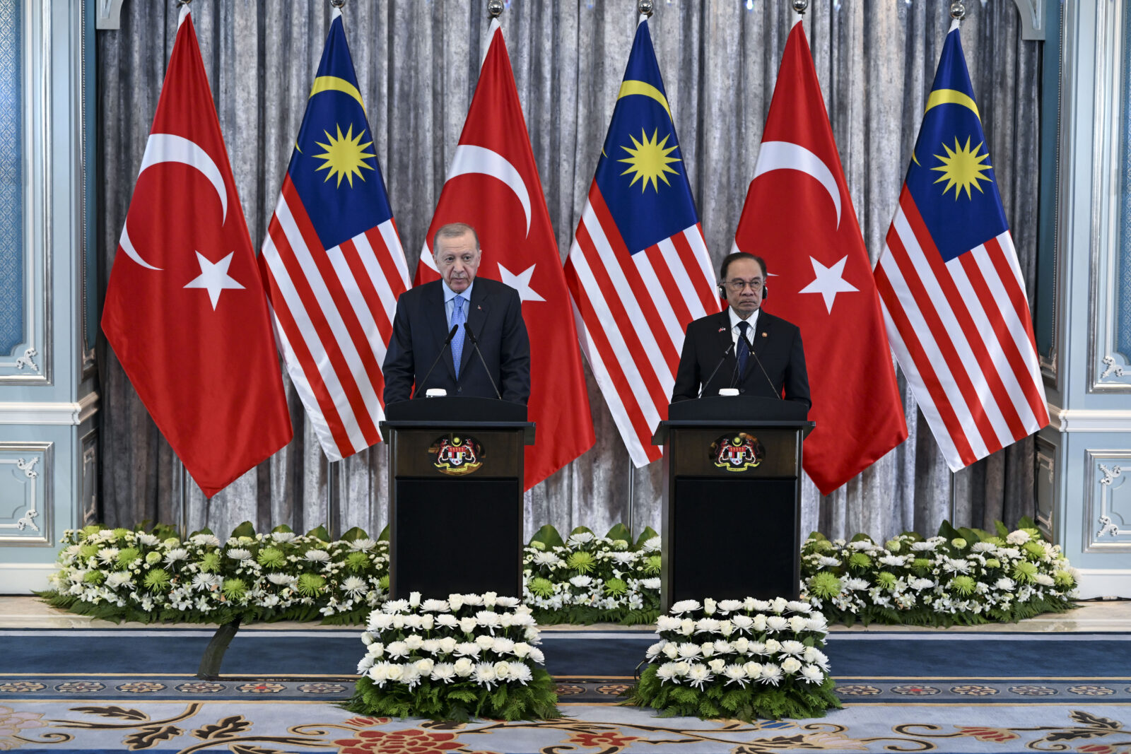 President Recep Tayyip Erdogan (L) and Malaysian Prime Minister Anwar Ibrahim (R) hold a joint press conference after their meeting in Putrajaya, Malaysia on Feb. 11, 2025. (AA Photo)