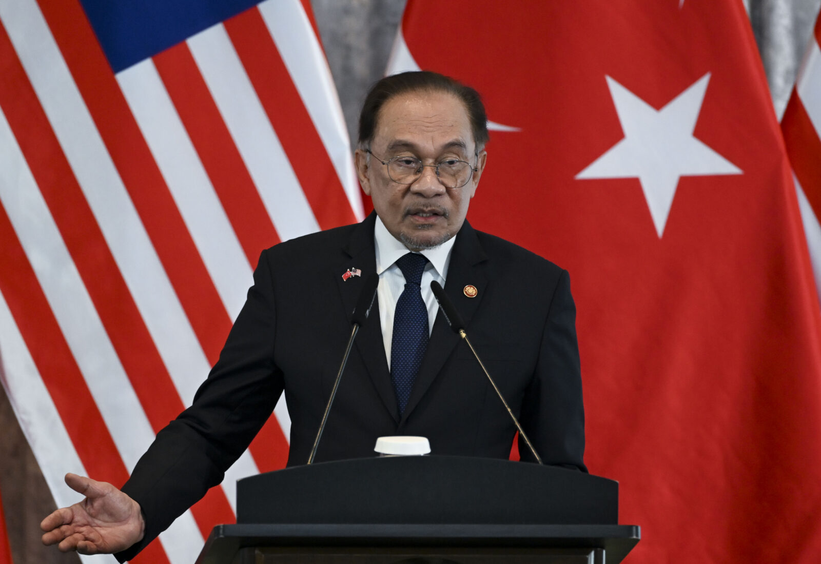 Malaysian Prime Minister Anwar Ibrahim speaking in a joint press conference with President Recep Tayyip Erdogan after their meeting in Putrajaya, Malaysia on Feb. 11, 2025. (AA Photo)